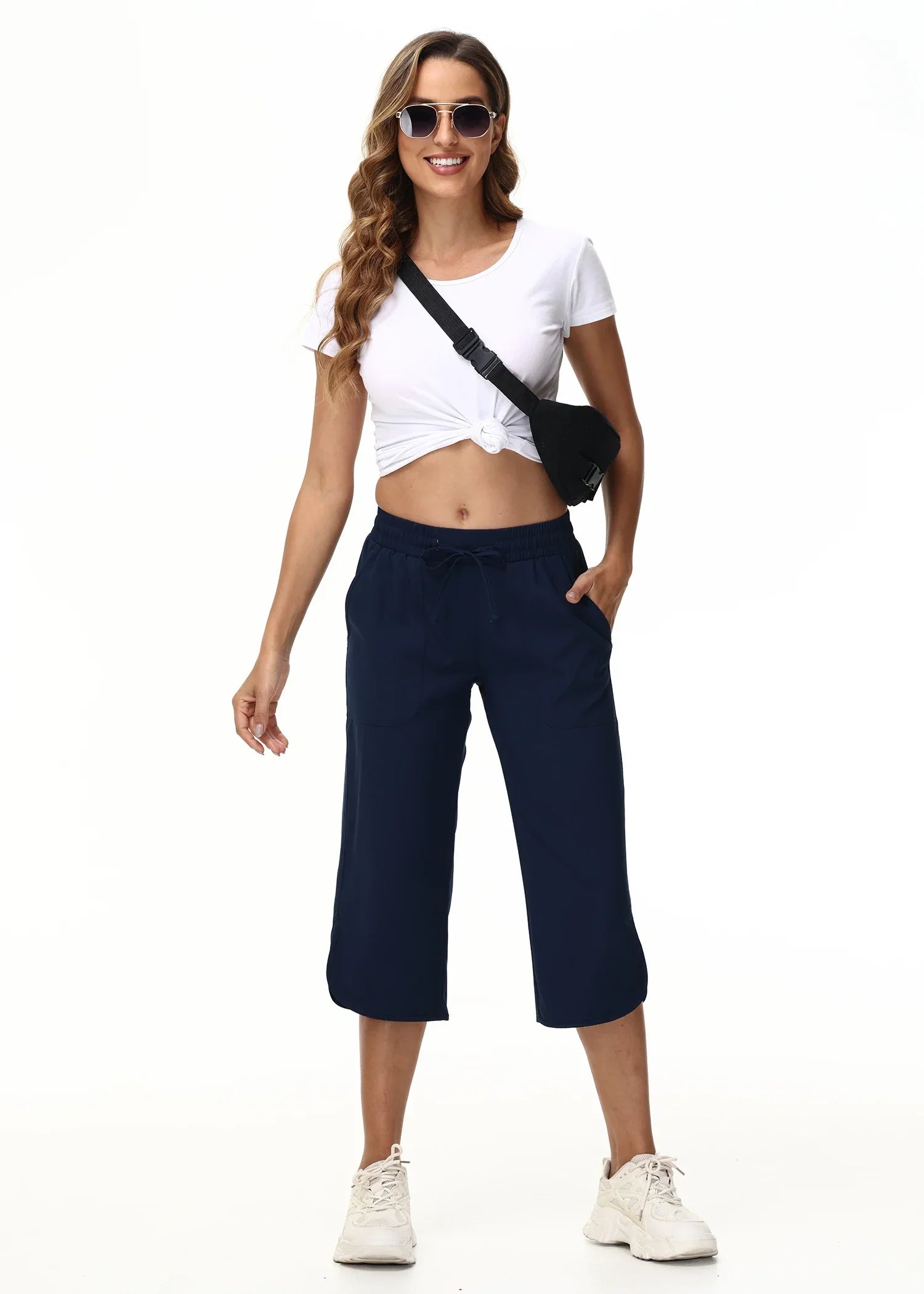 Calça Capri de Tecido Tecnológico Wide Leg com Bolsos Cargo Lenogue