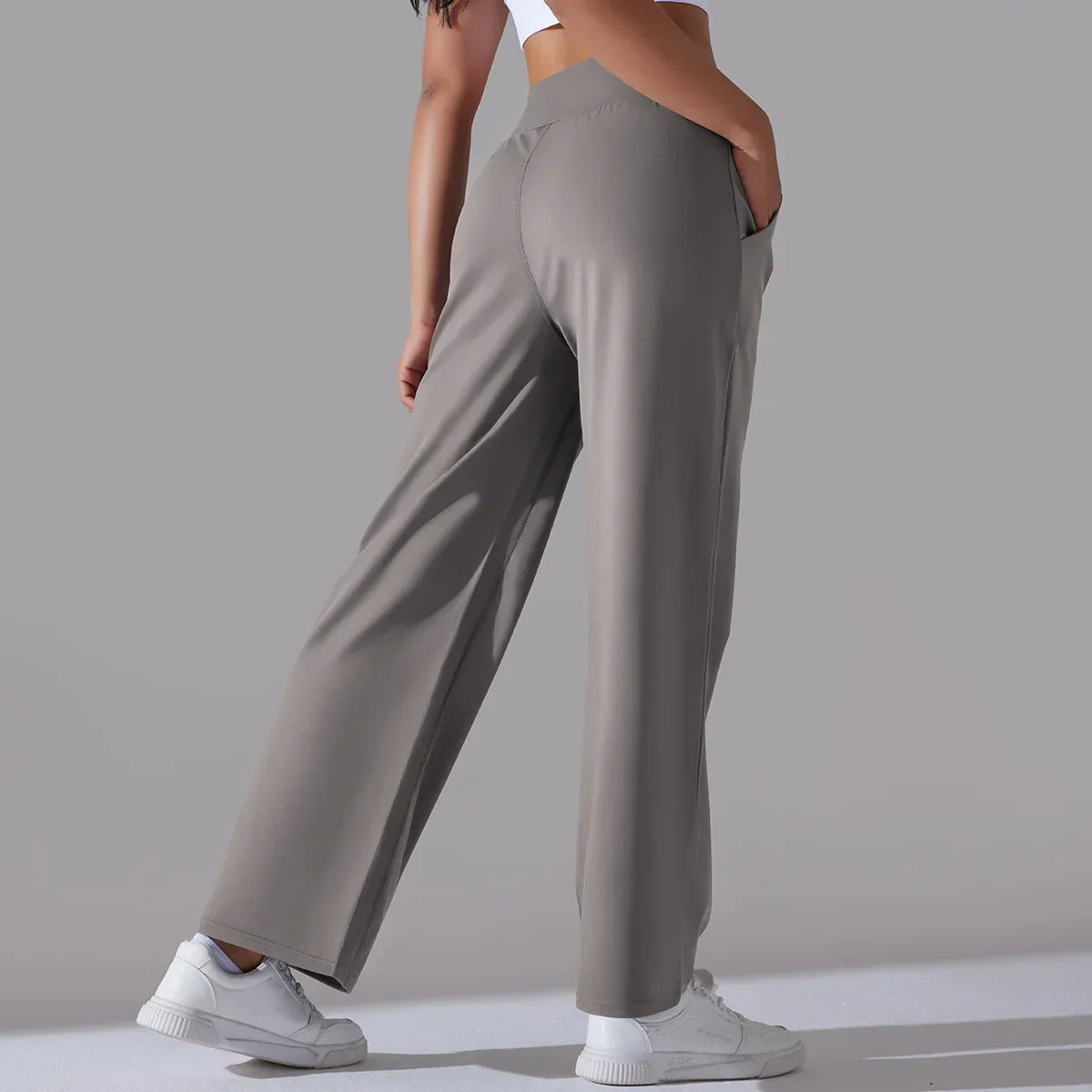 Calça Esportiva de Malha Tecnológica Cintura Alta Wide Leg Lenogue