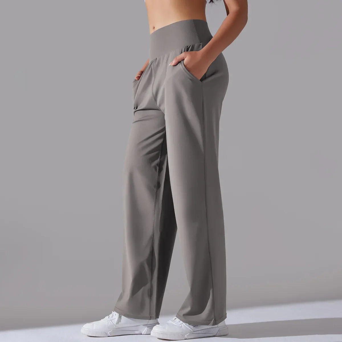 Calça Esportiva de Malha Tecnológica Cintura Alta Wide Leg Lenogue