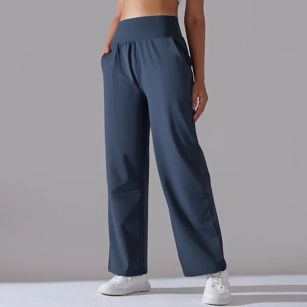 Calça Esportiva de Malha Tecnológica Cintura Alta Wide Leg Lenogue