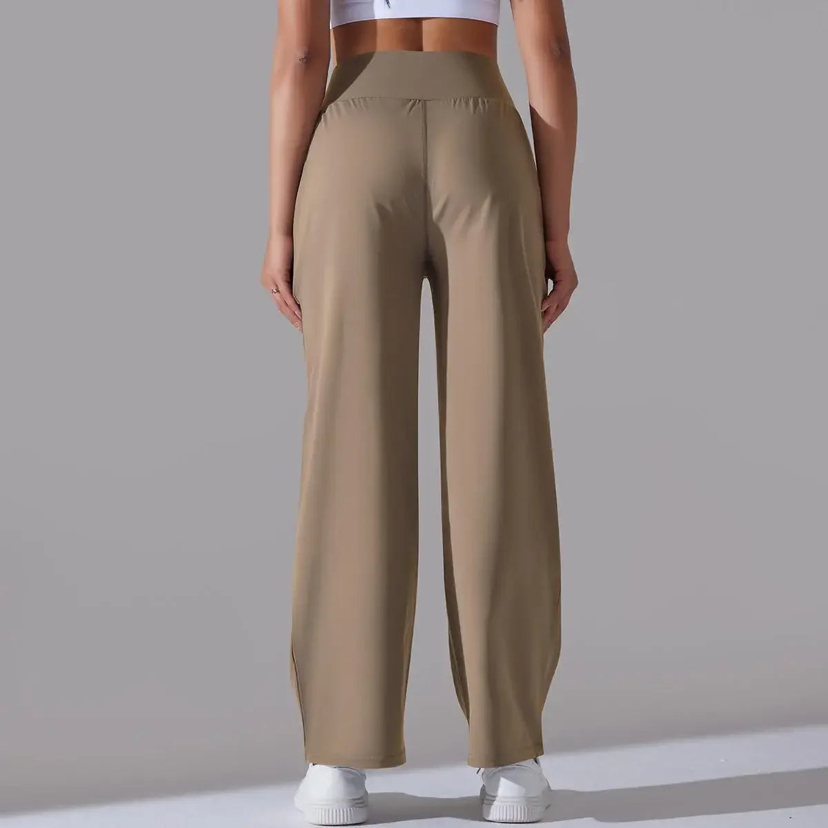 Calça Esportiva de Malha Tecnológica Cintura Alta Wide Leg Lenogue
