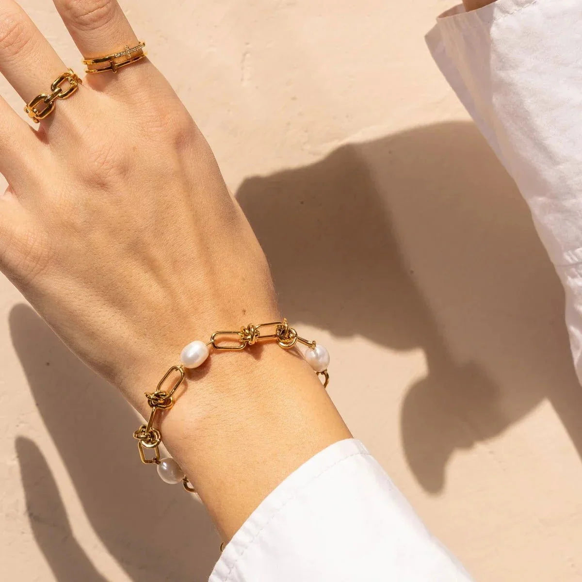 Pulseira Radiant Nó e Pérolas Lenogue Ouro