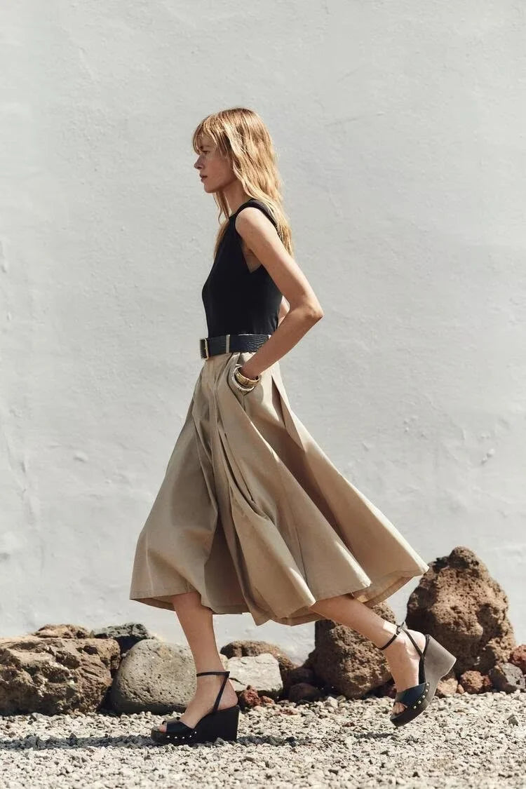 Vestido Midi Plissado em Tricot com Cinto para Festas Lenogue