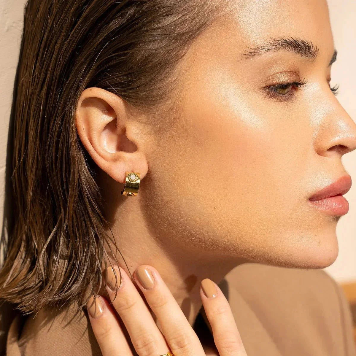 Brinco Luxurious Giratório Numeral Romanos Lenogue Ouro