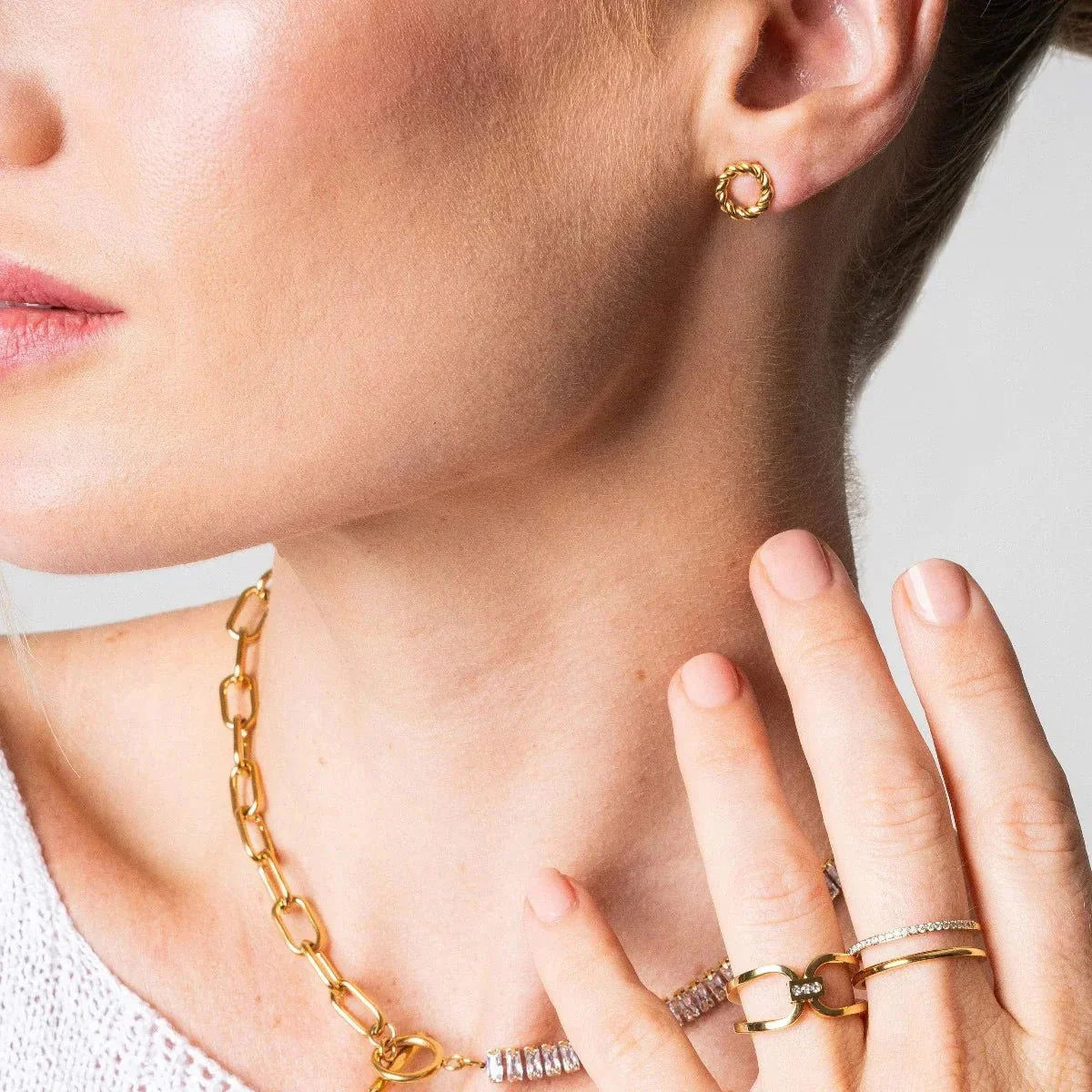 Brinco Prestigious Twist Lenogue Ouro