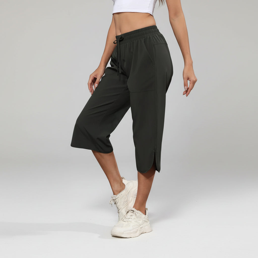 Calça Capri de Tecido Tecnológico Wide Leg com Bolsos Cargo Lenogue Preto / p