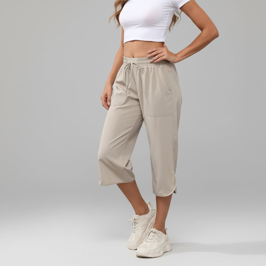 Calça Capri de Tecido Tecnológico Wide Leg com Bolsos Cargo Lenogue Bege / p